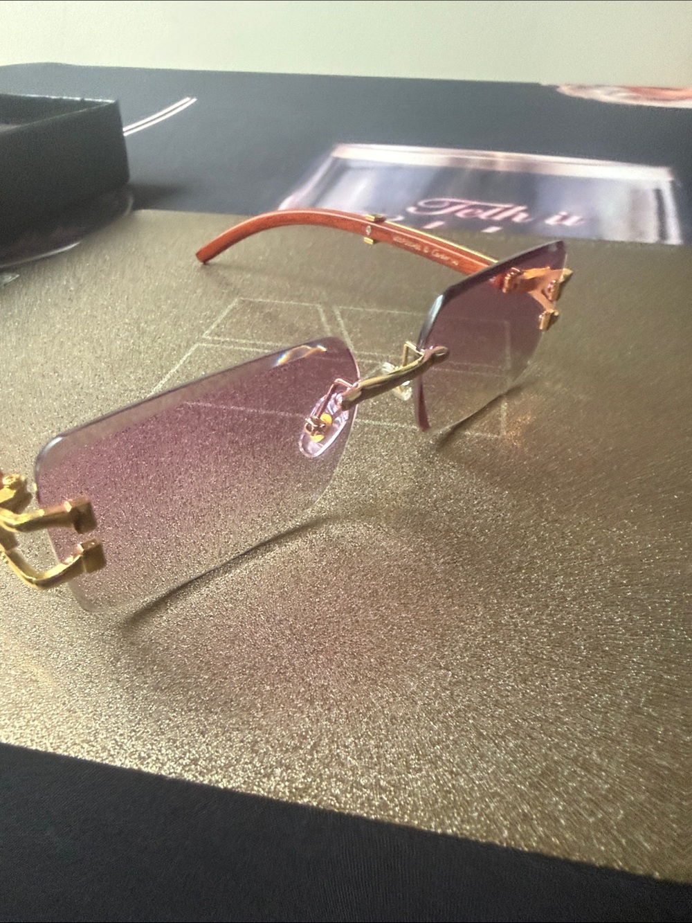 Cartier Pink Rimless Sunglasses with Gold Accents